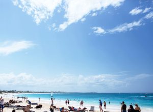 Bright blue sky spread over beach with white sand